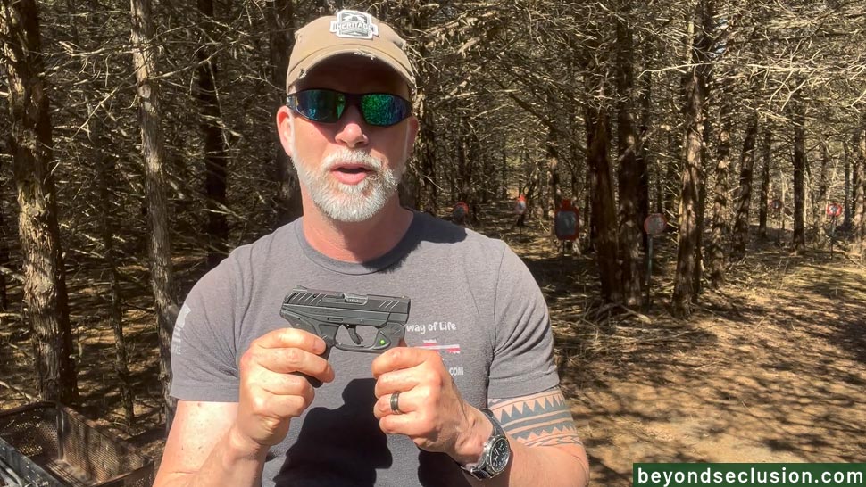 A Man Is Showing the Ruger LCP 2 in the 22 LR Caliber