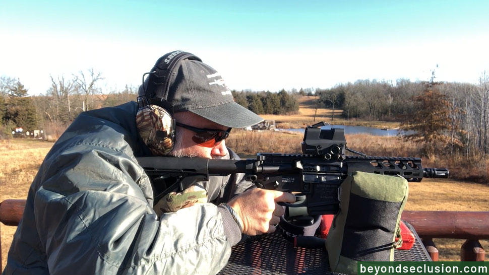 A Man Is Shooting with An SBR Rifle